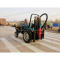 Remote control tractor water well drilling rig